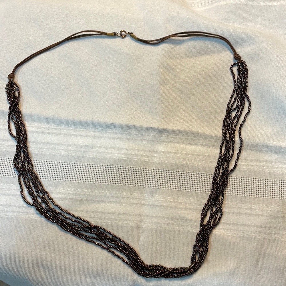 Necklace! Brown with purple hues! 15 inches